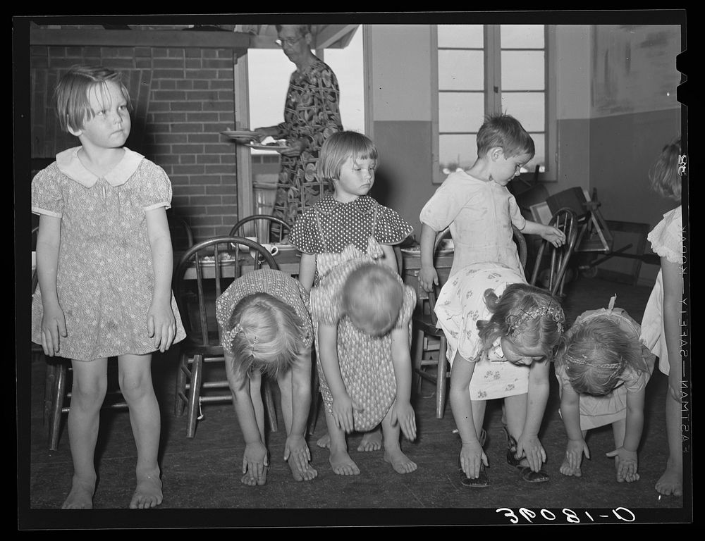 Children taking setting-up exercises at the WPA (Work Projects Administration) nursery school at Agua Fria migratory labor…