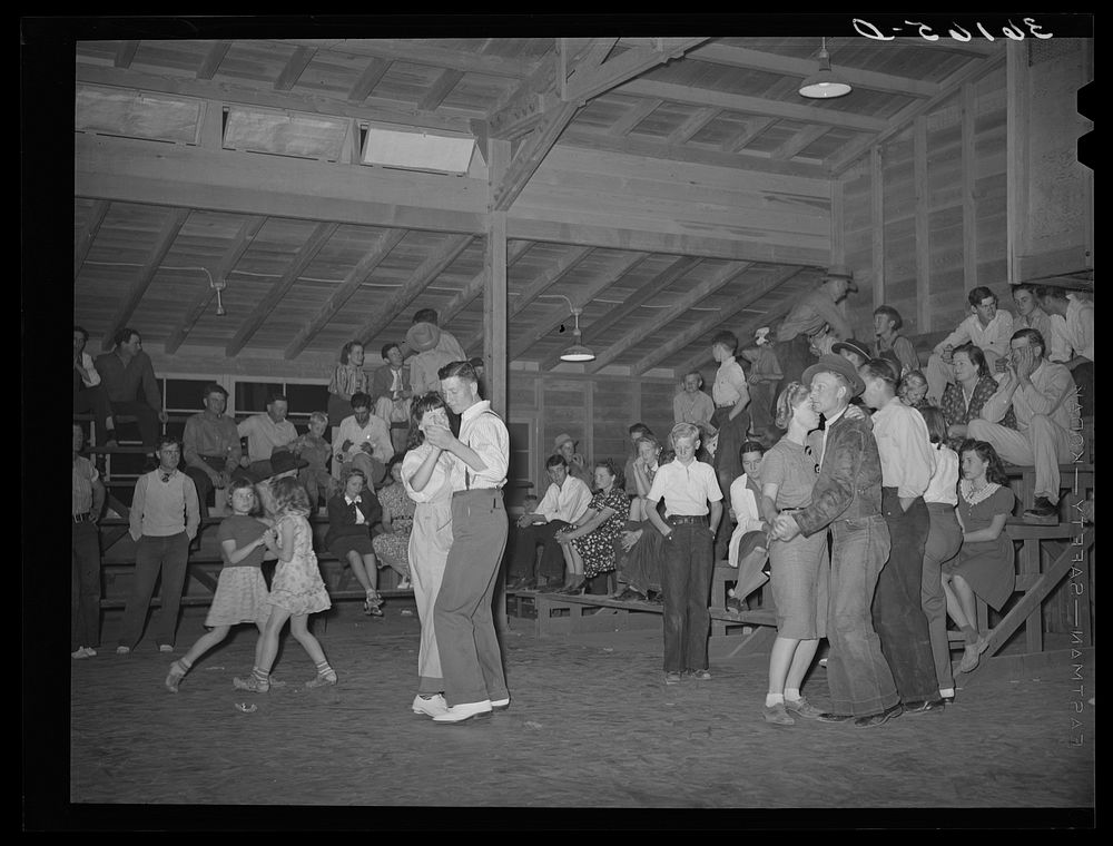 Saturday night dance in the community building of the Agua Fria migratory labor camp. Arizona by Russell Lee