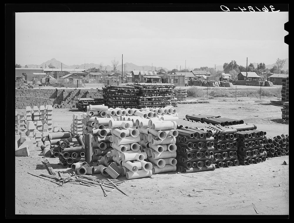 Tile fence posts and brick are standard part of stock of the United Producers and Consumers Cooperative. Phoenix, Arizona by…