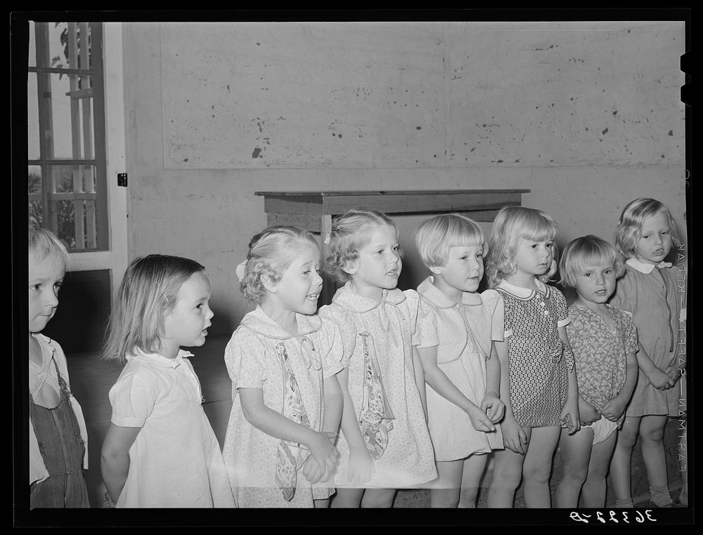 Children singing at the WPA (Work Projects Administration) nursery school. Casa Grande Valley Farms, Pinal County, Arizona…
