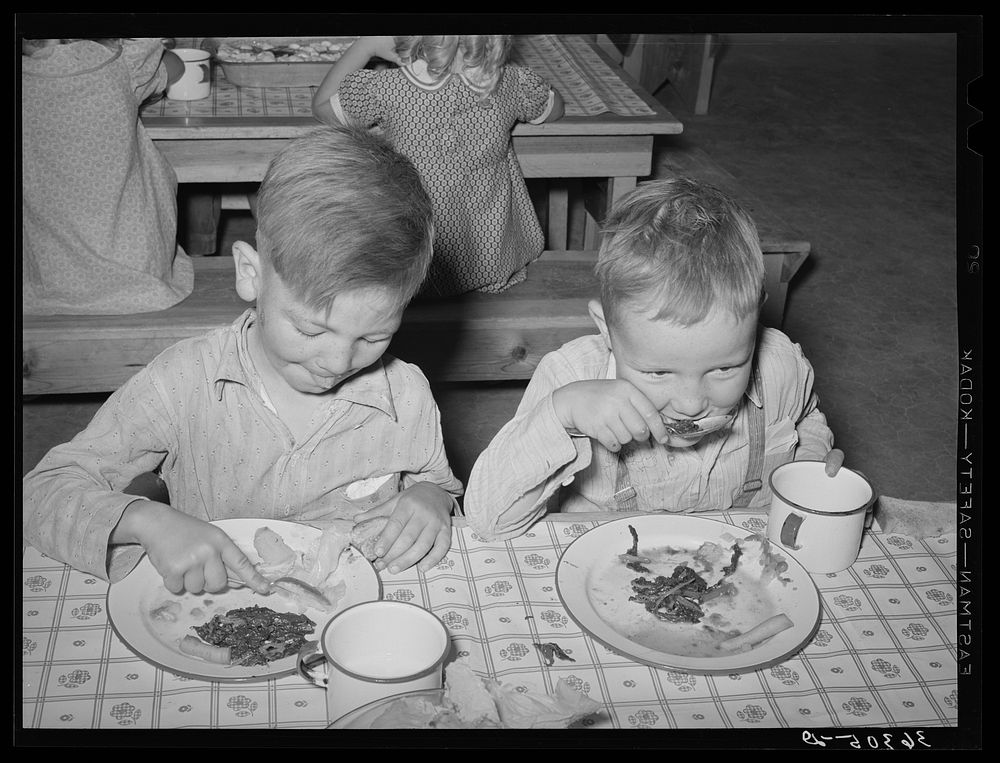 Boys eating their lunch at the WPA (Work Projects Administration) nursery school at Casa Grande Valley Farms. Pinal County…