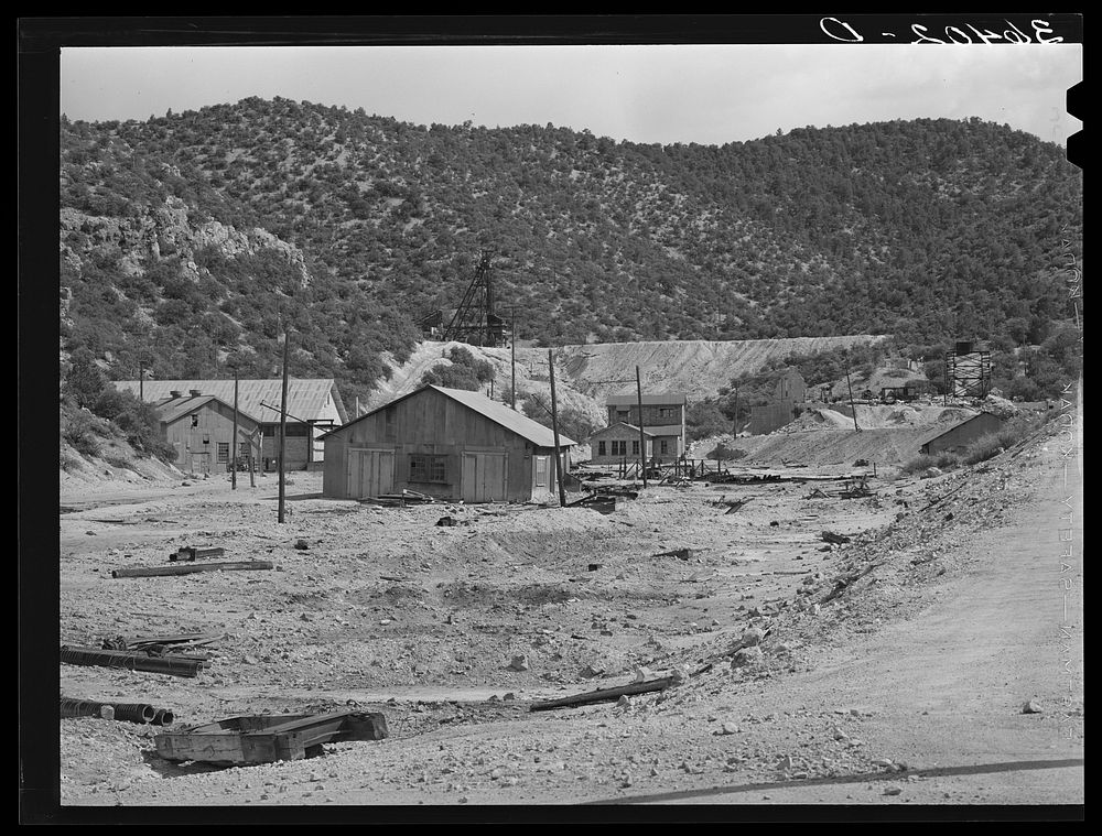 [Untitled photo, possibly related to: Old buildings and working of Burro Mountain. Copper County, Tyrone, New Mexico] by…