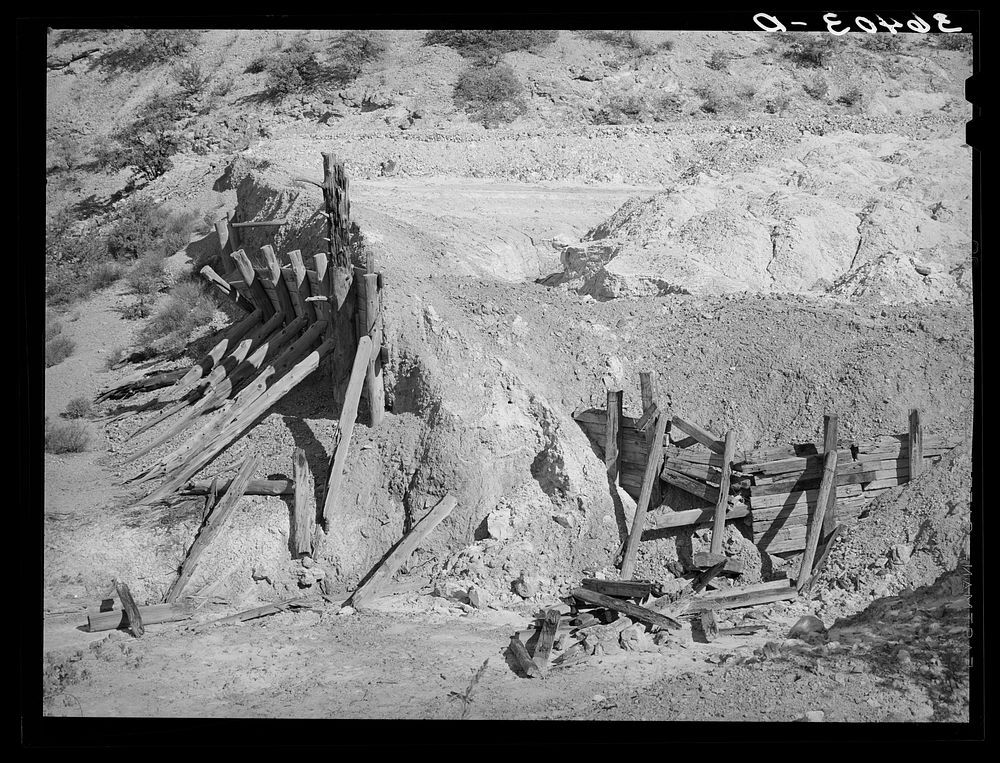 [Untitled photo, possibly related to: Remains of timber support and tailings of abandoned copper mine at Leopold, New…