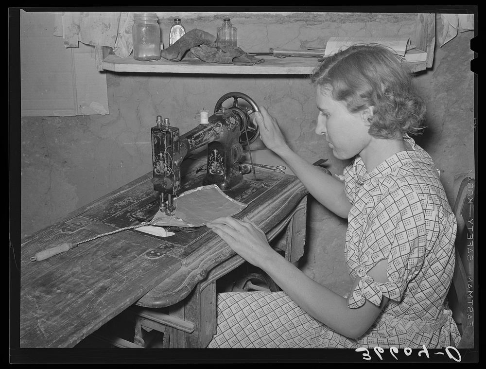 Mrs. Jack Whinery making a fly swatter. These homesteaders never buy anything that they can make at home. Pie Town, New…