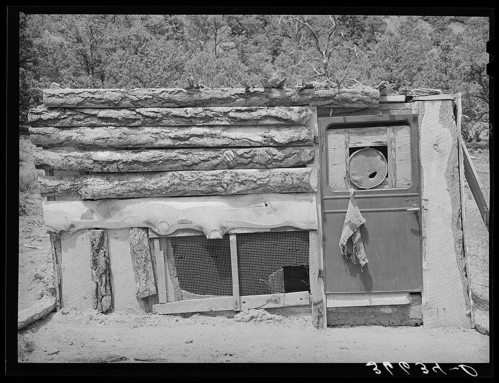Hen house on farm of Faro Caudill. Notice the old automobile door which has been utilized. Pie Town, New Mexico by Russell…