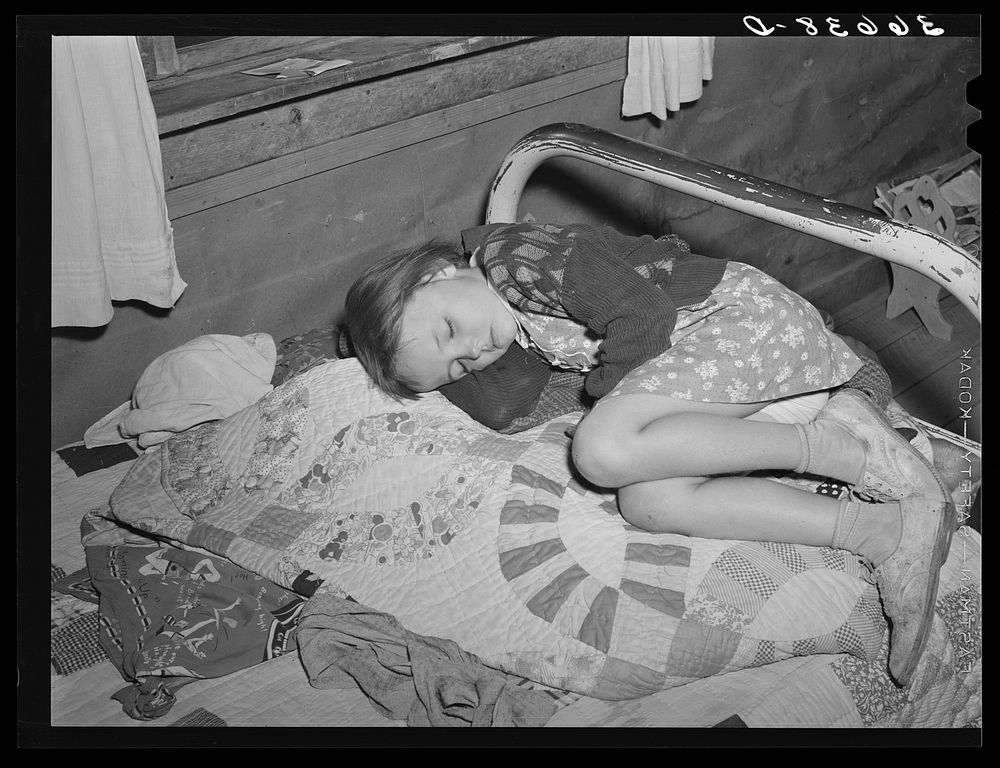 Josie Caudill asleep at Forty-two party. Pie Town, New Mexico by Russell Lee