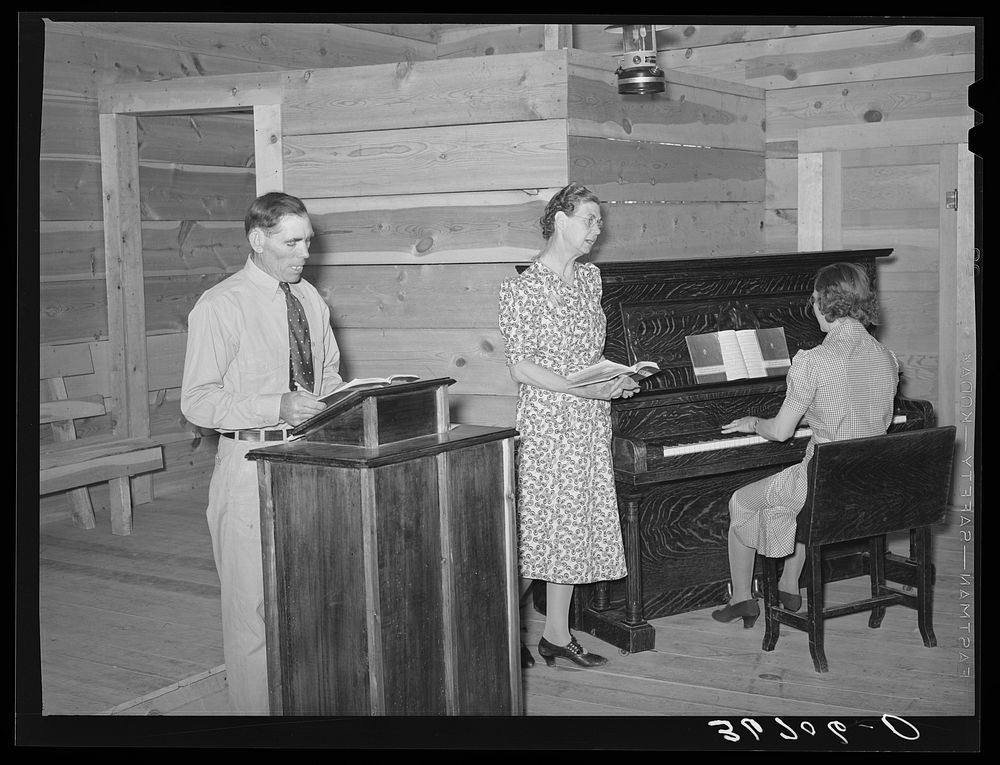 Singing at church services. Pie Town, New Mexico by Russell Lee