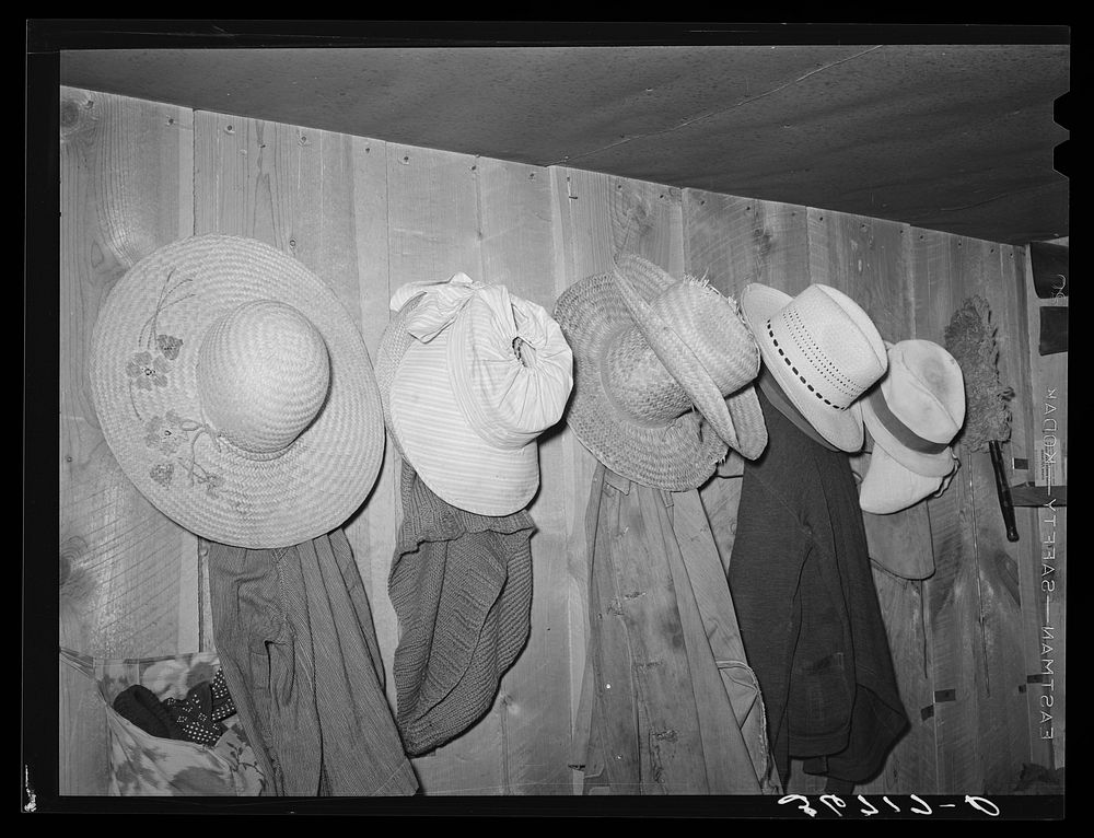 Farmers' hats seen in the house of George Hutton, homesteader at Pie Town, New Mexico by Russell Lee