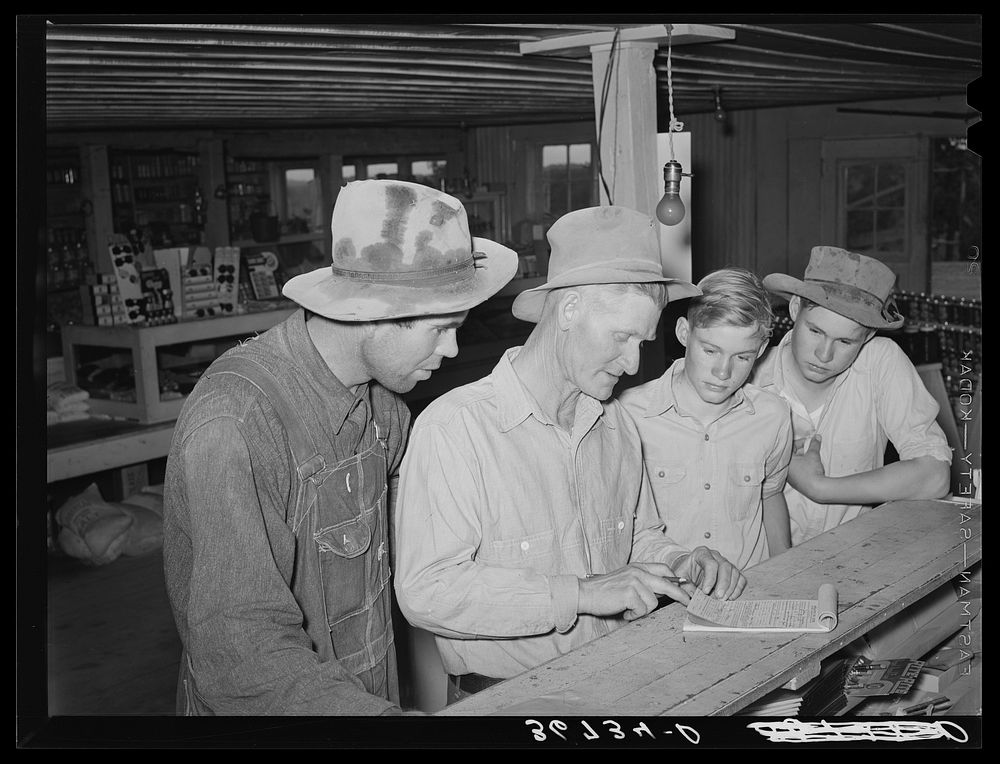Farmers in general store at Pie Town, New Mexico by Russell Lee