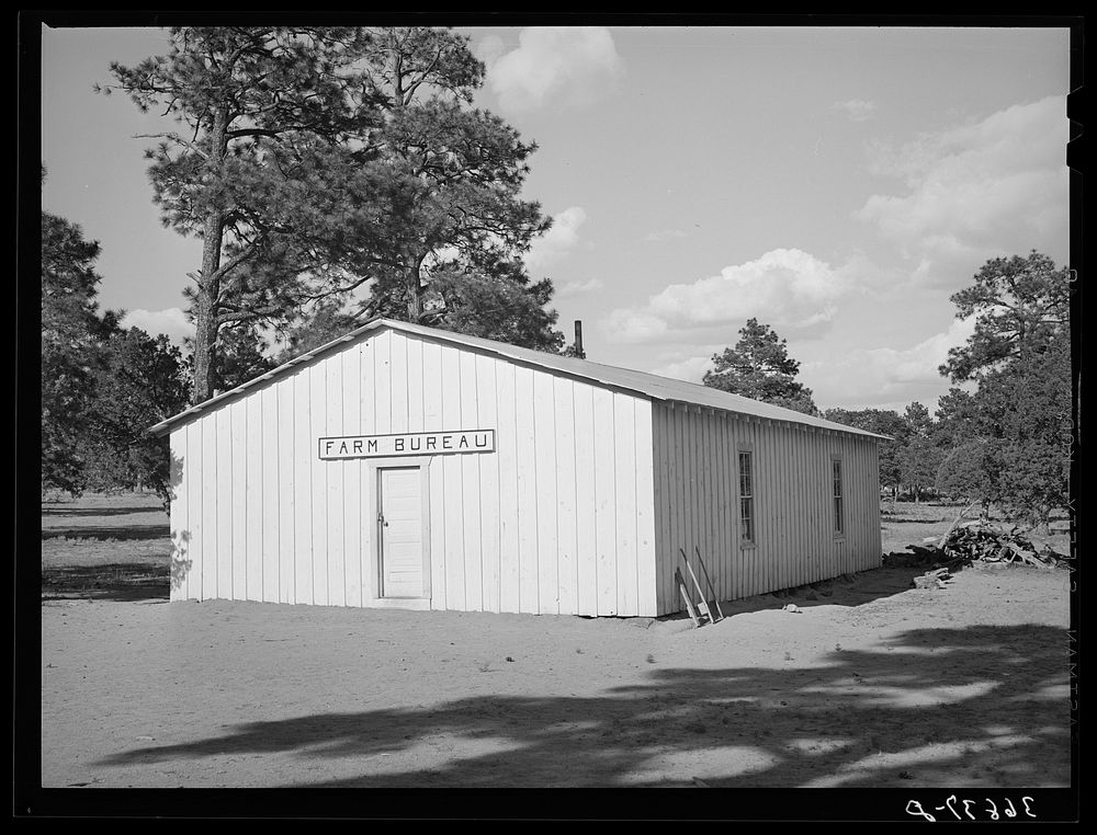 Farm Bureau building. Pie Town, New Mexico. The lumber for the building was placed on the grounds by Mr. Craig three years…