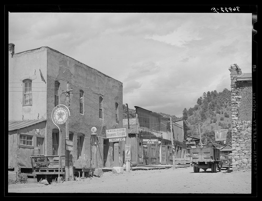 Main street of Mogollon, New Mexico. Second largest gold section in the state by Russell Lee