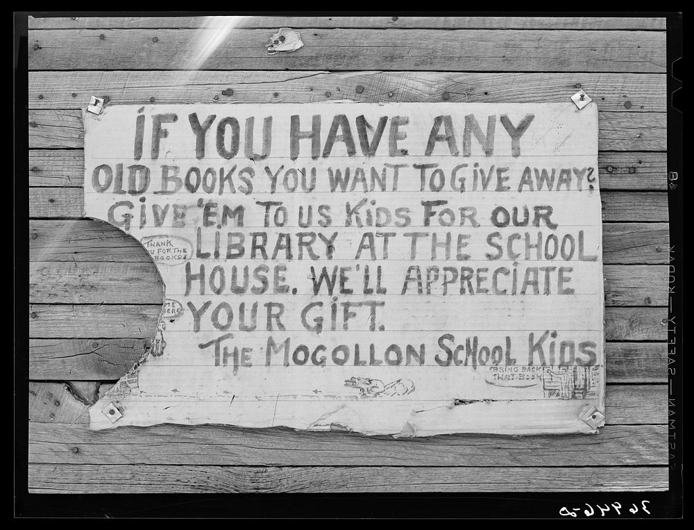 Sign on side of building. Mogollon, New Mexico by Russell Lee