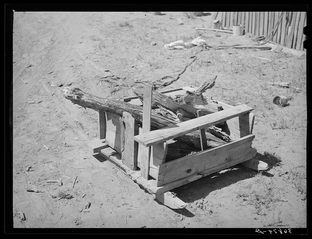 Sled for hauling wood, homesteader's farm. Pie Town, New Mexico. The abundance of wood for cooking and fuel is a never…