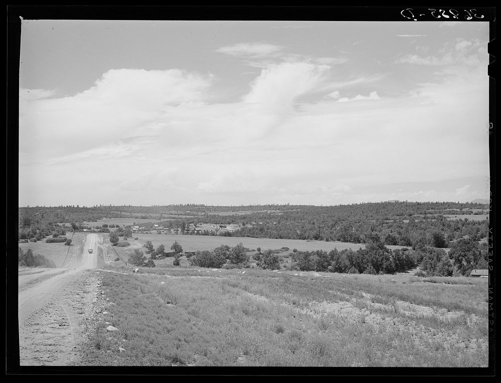 Character of farming country and distant view of Chilili. Bernalillo County, New Mexico by Russell Lee