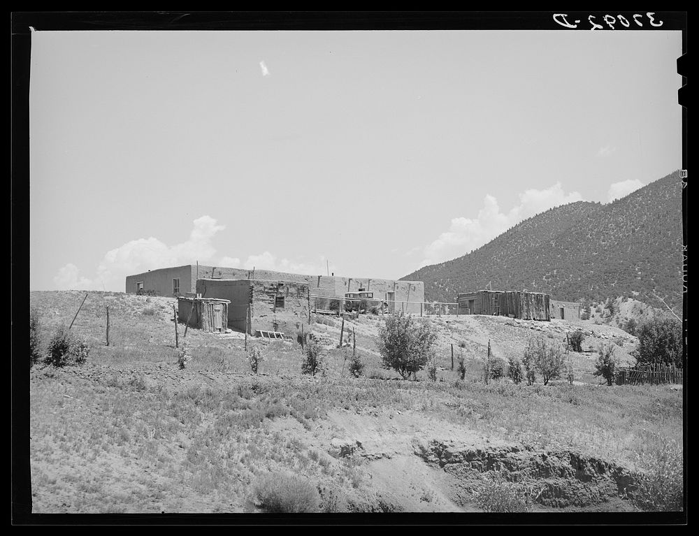 [Untitled photo, possibly related to: Spanish-American farmstead with stream running past. Amalia, New Mexico] by Russell Lee