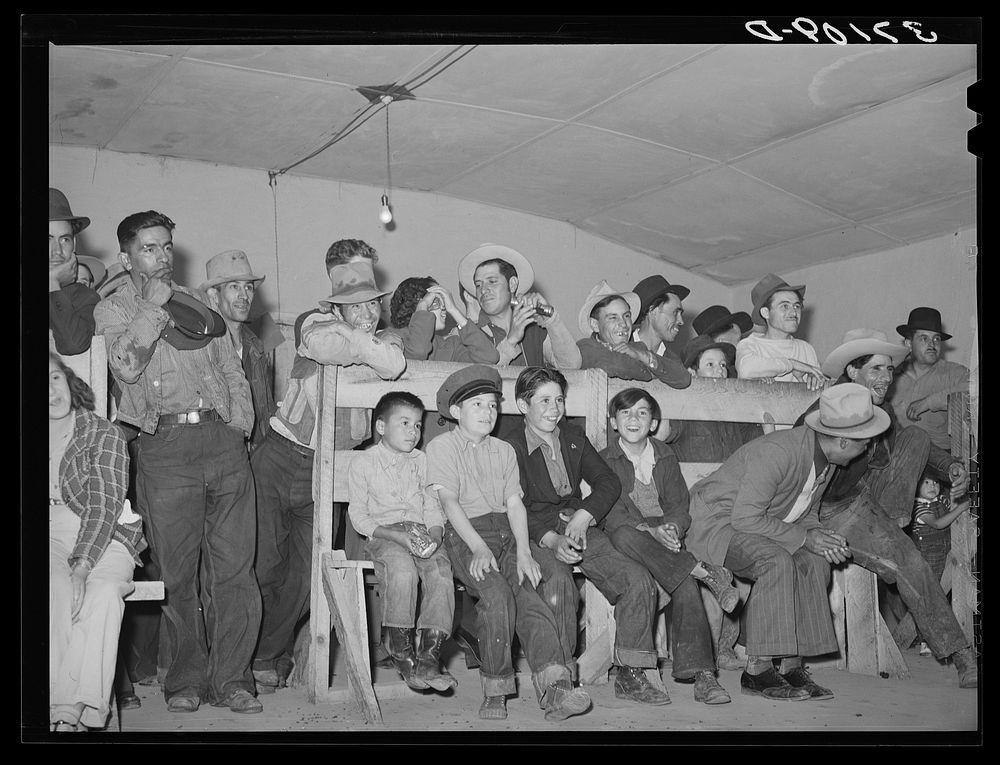 Audience of Spanish-Americans at traveling show. Penasco, New Mexico by Russell Lee