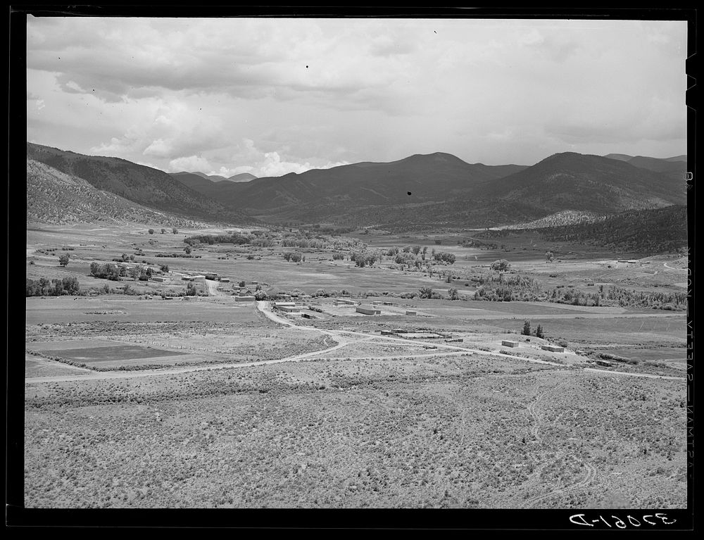 [Untitled photo, possibly related to: The valley of the Rio Costilla at Amalia, New Mexico. The irrigated farmland is in the…