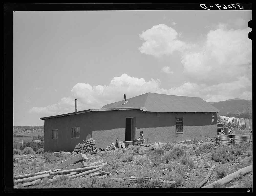Home of Spanish-American farmer. Amalia, New Mexico by Russell Lee