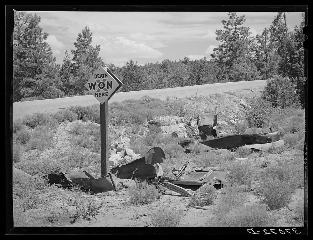 [Untitled photo, possibly related to: Marker of accident on highway in Bernalillo County, New Mexico] by Russell Lee
