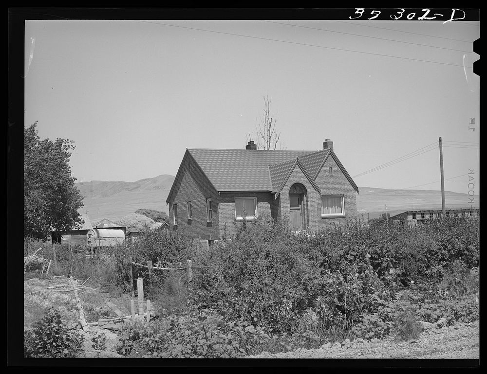 Home of Mormon farmer, one of the Ericson brothers, who are FSA (Farm Security Administration) clients. Box Elder County…