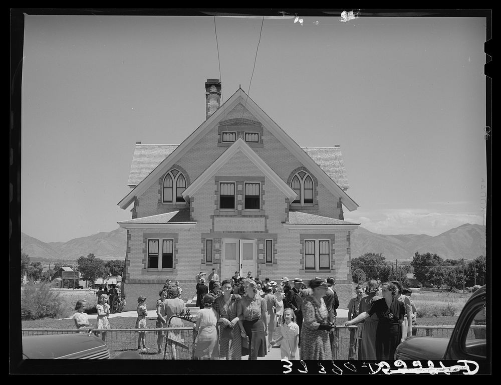 [Untitled photo, possibly related to: Congregation leaving Latter Day Saints Church. Mendon, Utah] by Russell Lee
