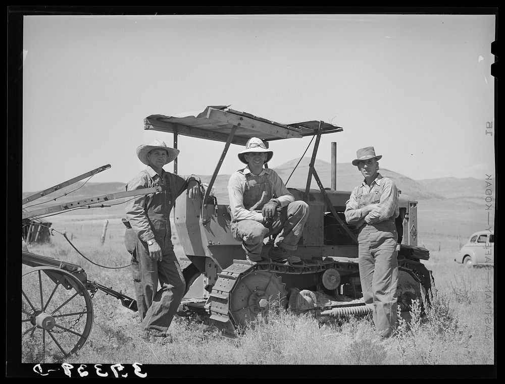 The Ericson brothers and their cooperative tractor bought with a FSA (Farm Security Administration) loan. Box Elder County…