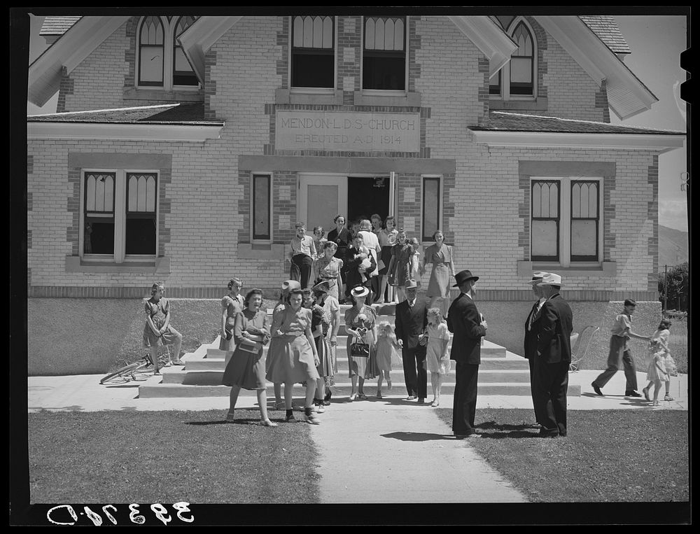 Congregation leaving the Latter Days Saints Church at Mendon, Utah by Russell Lee