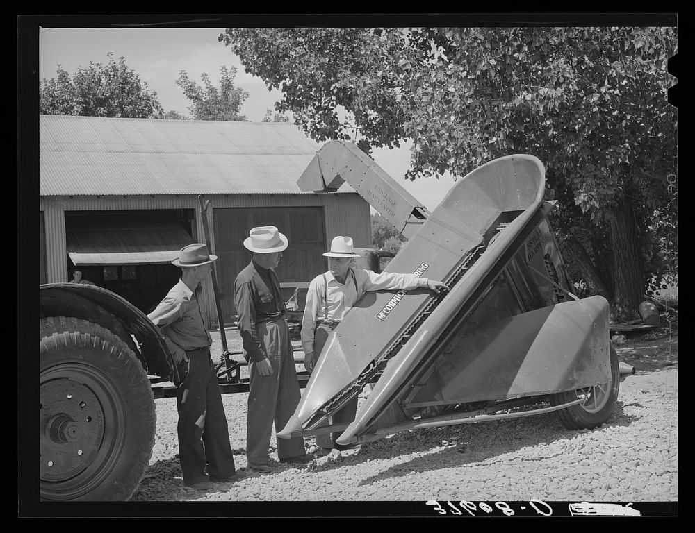 Committee of Cornish machinery cooperative looking over equipment which they will buy. Preston, Idaho by Russell Lee