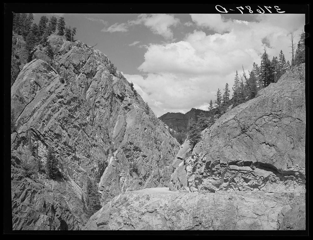 [Untitled photo, possibly related to: The Million Dollar Highway between Silverton and Ouray is cut through massive rock…