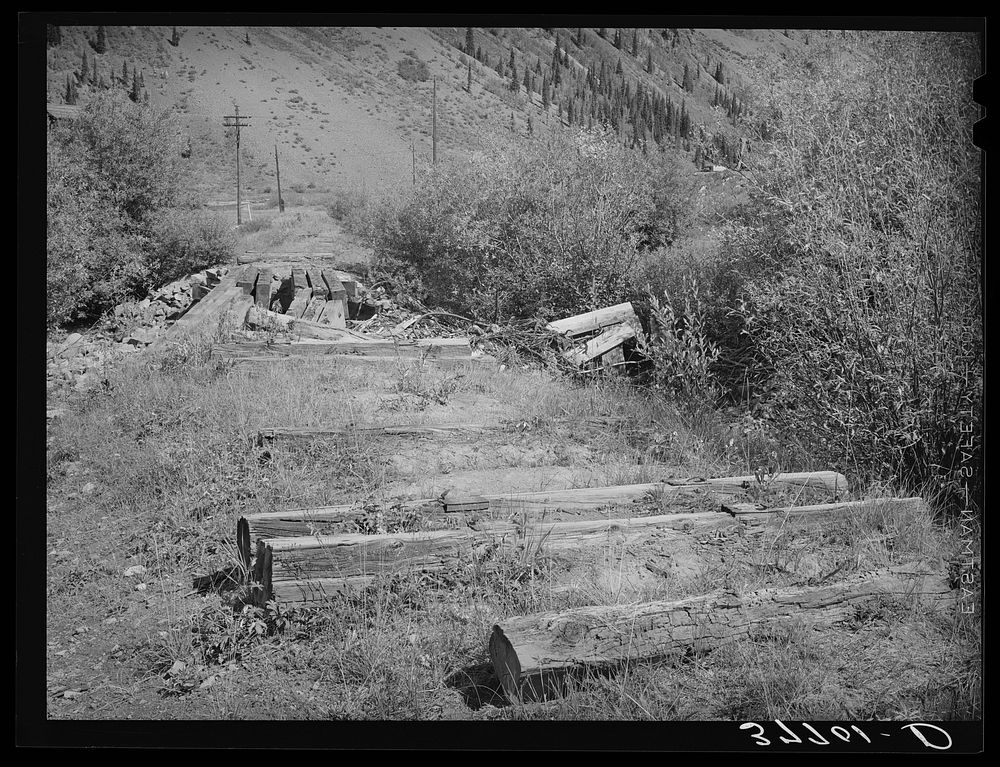 Ties of abandoned railroad in former active mining area of San Juan County, Colorado. The rails were pulled up and sold for…