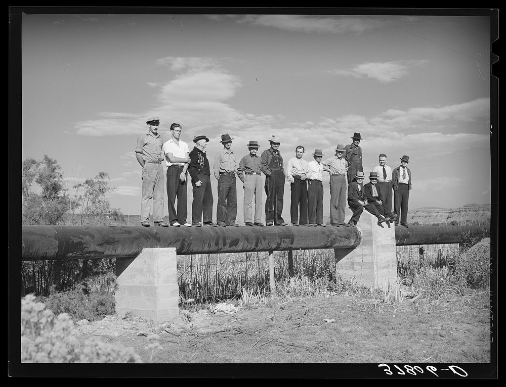 [Untitled photo, possibly related to: Member of FSA (Farm Security Administration) cooperative pipe line used for irrigation…