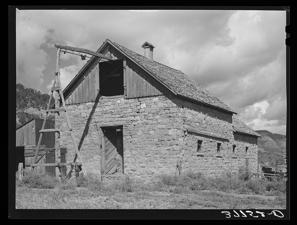 Old brick barn, one of the first constructed in the Animas River Valley. La Plata County, Colorado by Russell Lee