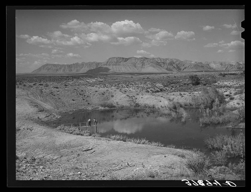 Irrigation water reservoir of FSA (Farm Security Administration) clients. Washington County, Utah by Russell Lee