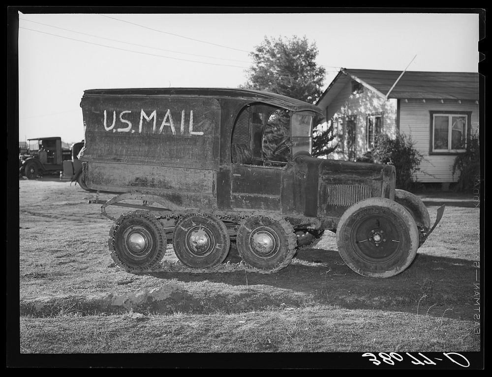 [Untitled photo, possibly related to: U.S. mail truck used in snowy mountain sections of Nevada County, California] by…