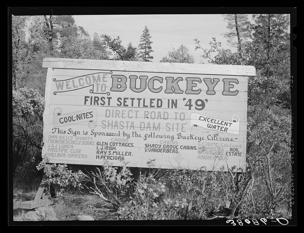 Sign at city limits of Buckeye, Shasta County, California. This is an old town, now become a boom town, because of…