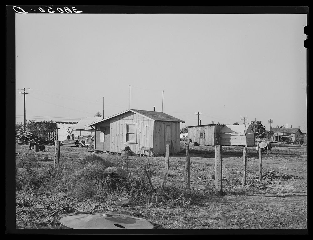 Part of Bull tract near Marysville, California. Houses set on half and one acre lot are sold to workers who build their…