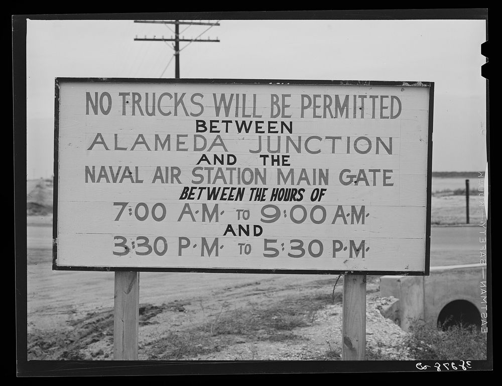 Traffic sign on road leading to the naval air base now under construction at Corpus Christi, Texas by Russell Lee