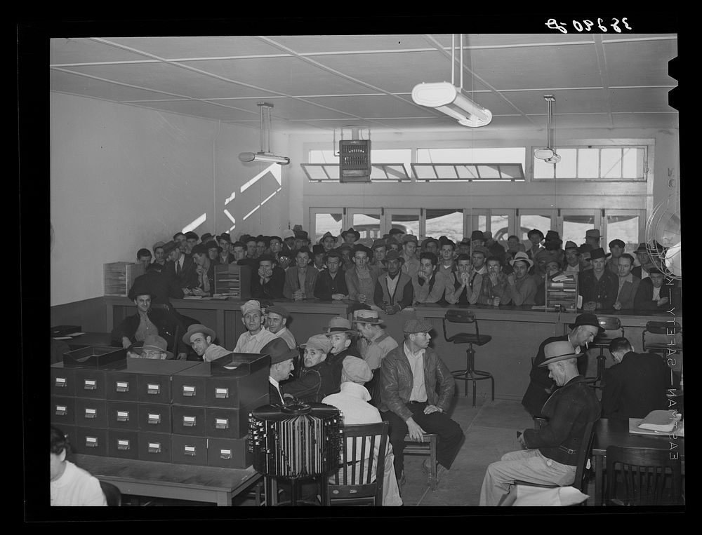 Men applying for work at the office of the Texas State Employment Service, Corpus Christi, Texas. In Corpus Christi there is…
