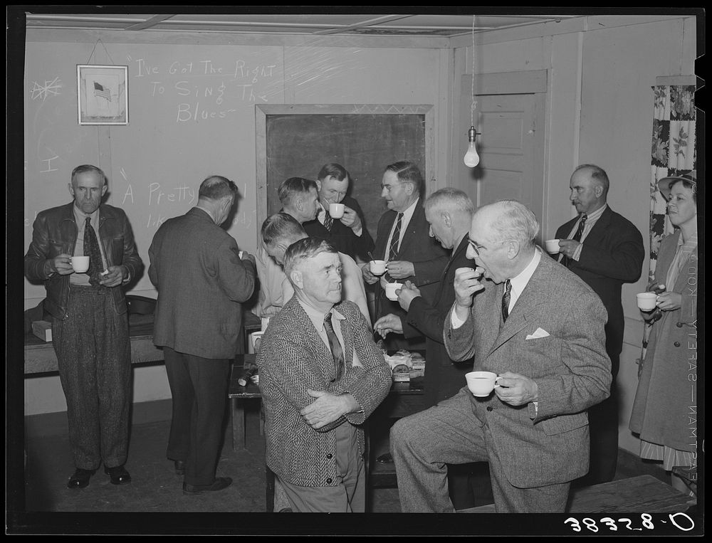 Refreshments at farmers' night meeting. Gold Hill, Placer County, California by Russell Lee