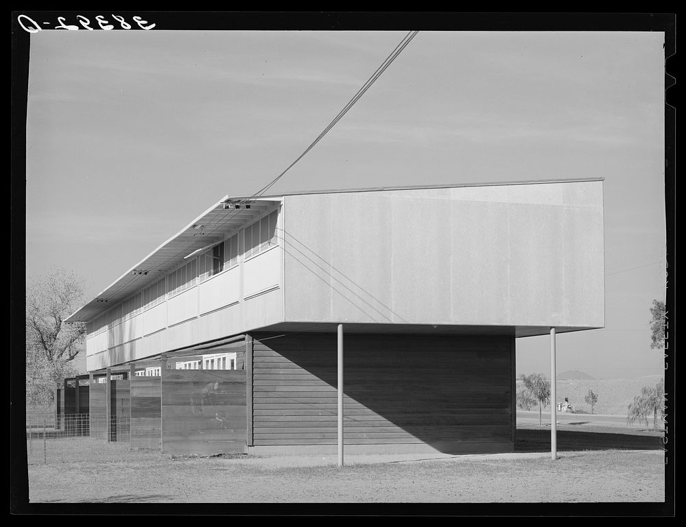 [Untitled photo, possibly related to: Row of apartments for permanent farm workers at the Yuba City farm workers' camp. Yuba…