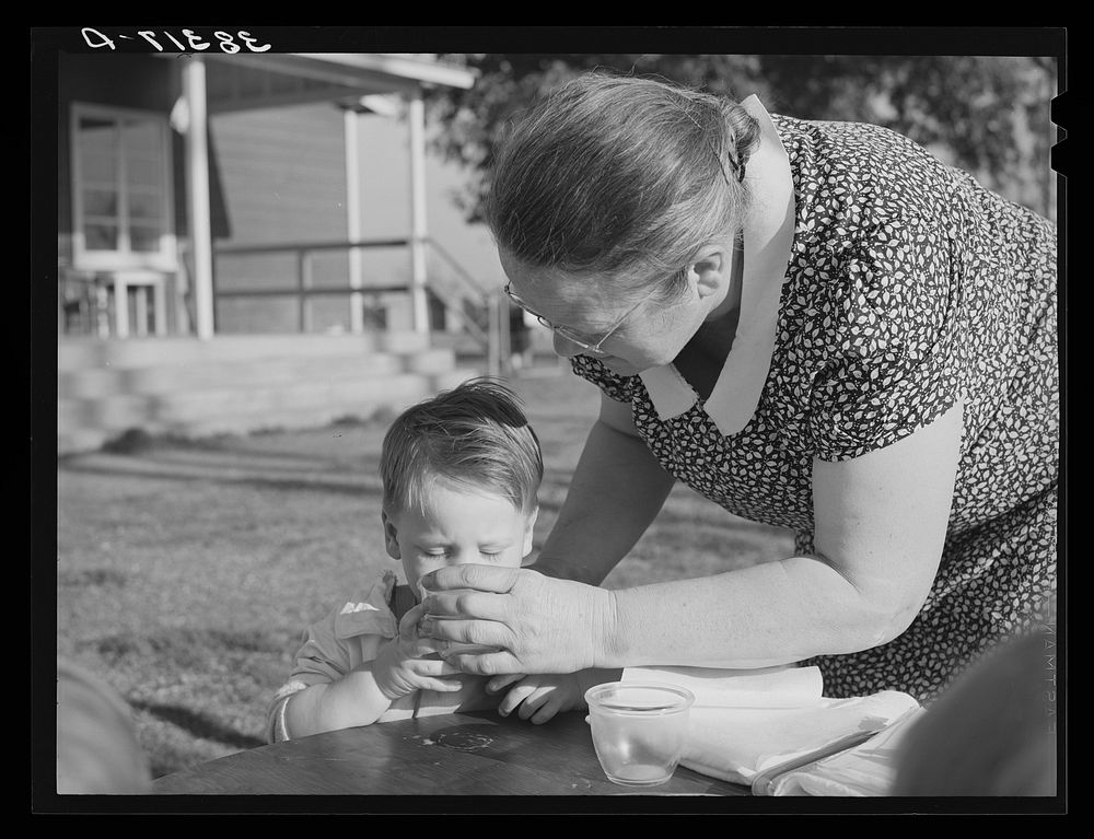 Milk for the children at the Yuba City FSA (Farm Security Administration) farm workers' camp. Yuba City, California by…