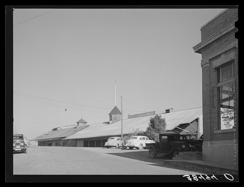 Corner of Bank of America and packing sheds of the Earl Fruit Company. New Castle, California by Russell Lee