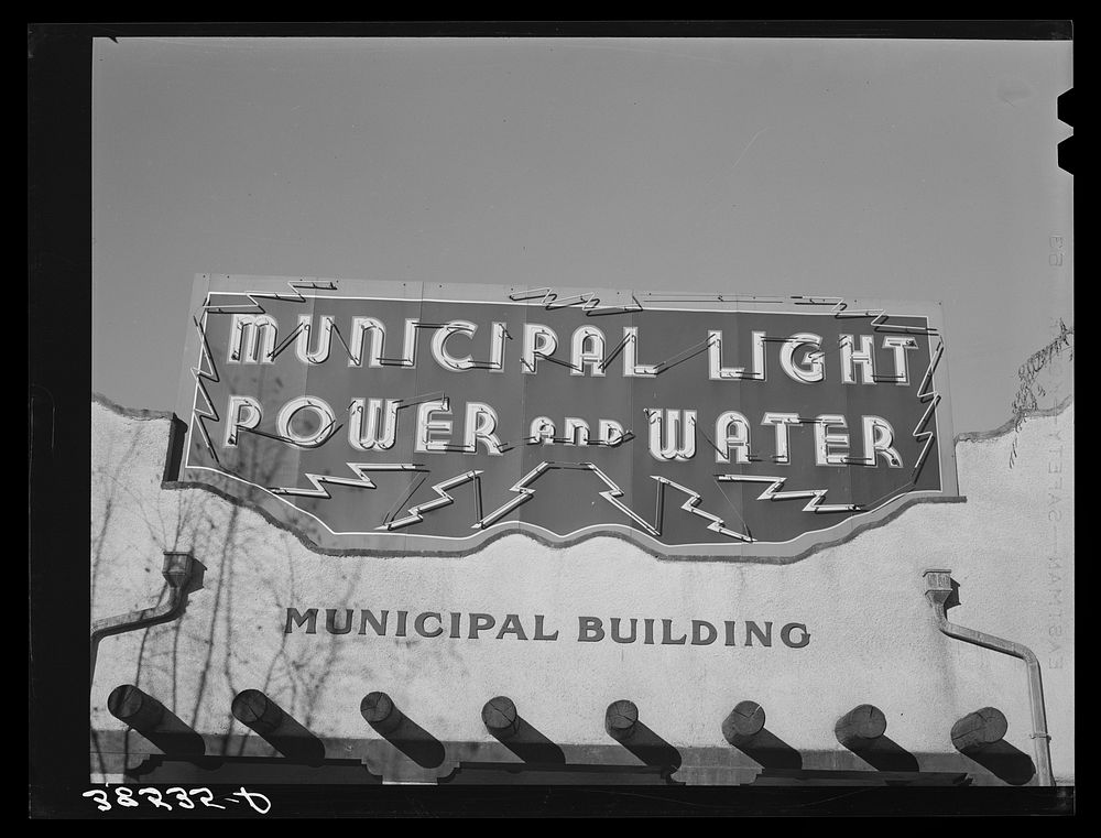 Sign on municipal building. La Junta, Colorado by Russell Lee