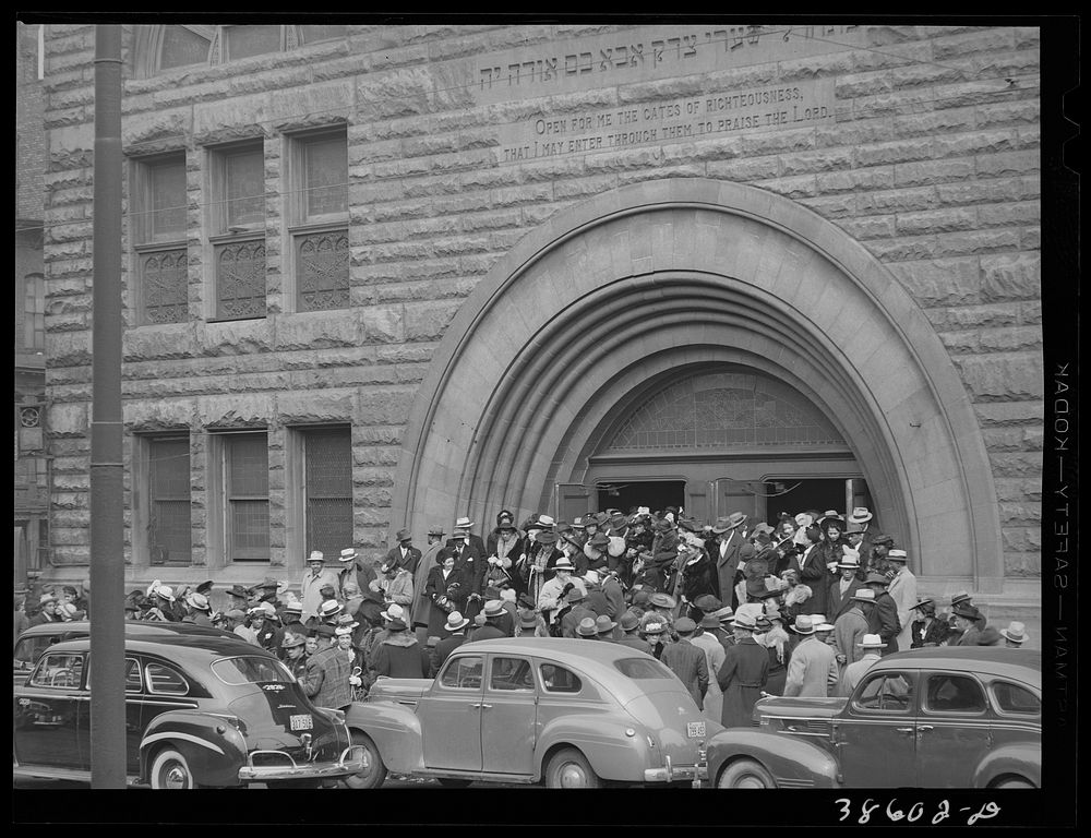 Crowd coming out of Pilgrim Baptist Church. Southside of Chicago, Illinois by Russell Lee