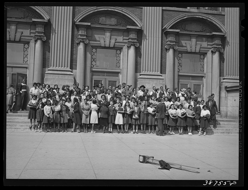 Children at high school being posed for photograph. Southside of Chicago, Illinois by Russell Lee
