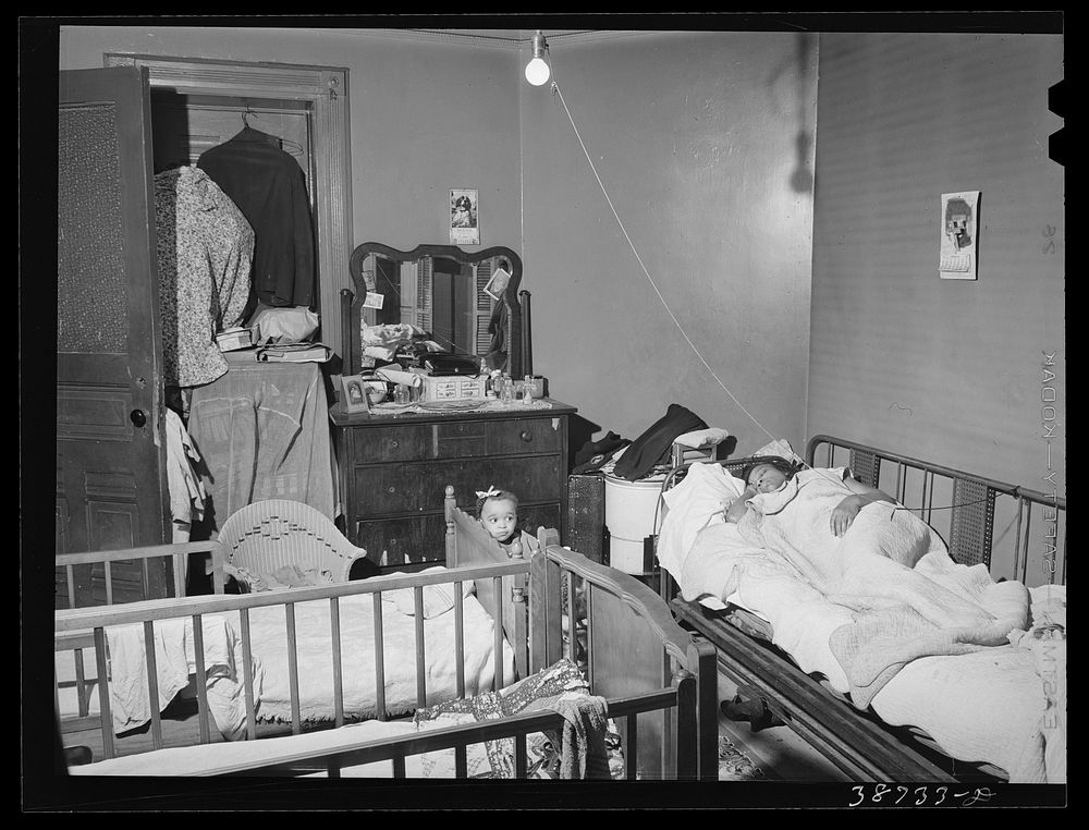 Crowded apartment of railroad worker. Chicago, Illinois by Russell Lee