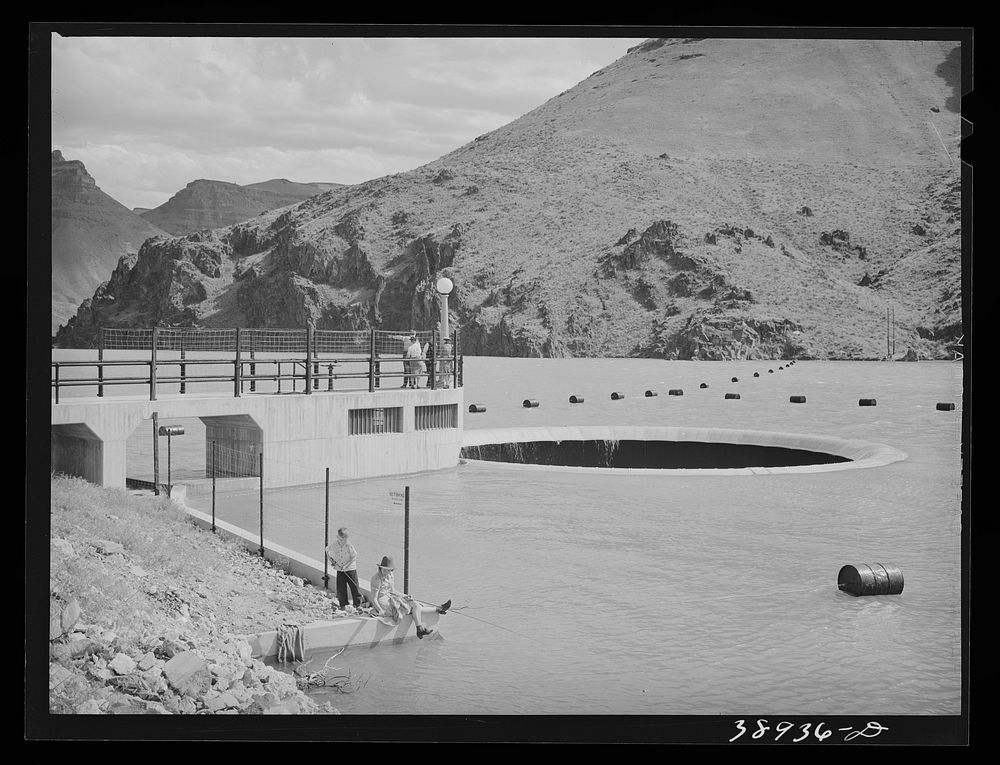 [Untitled photo, possibly related to: Glory hole of the Owyhee Reservoir. Water for the Vale-Owyhee irrigation project is…