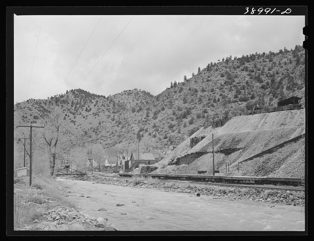 Pile of tailing from gold mill, defunct. Idaho Springs, Colorado by Russell Lee