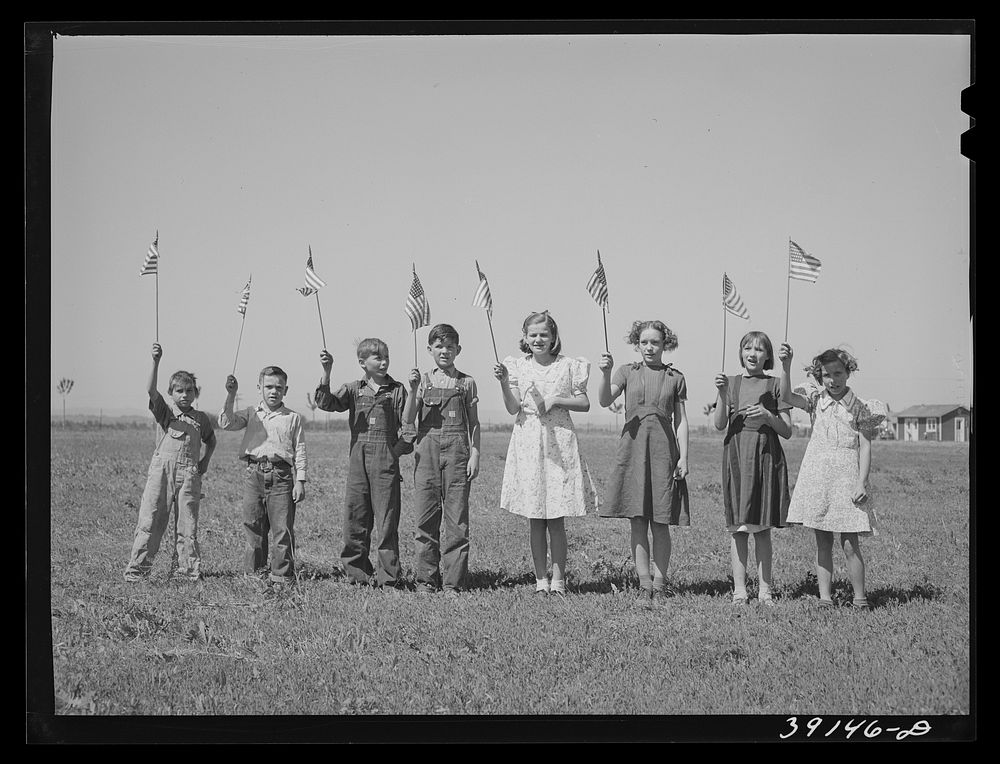 [Untitled photo, possibly related to: Flag drill for entertainment at end of school term at the FSA (Farm Security…
