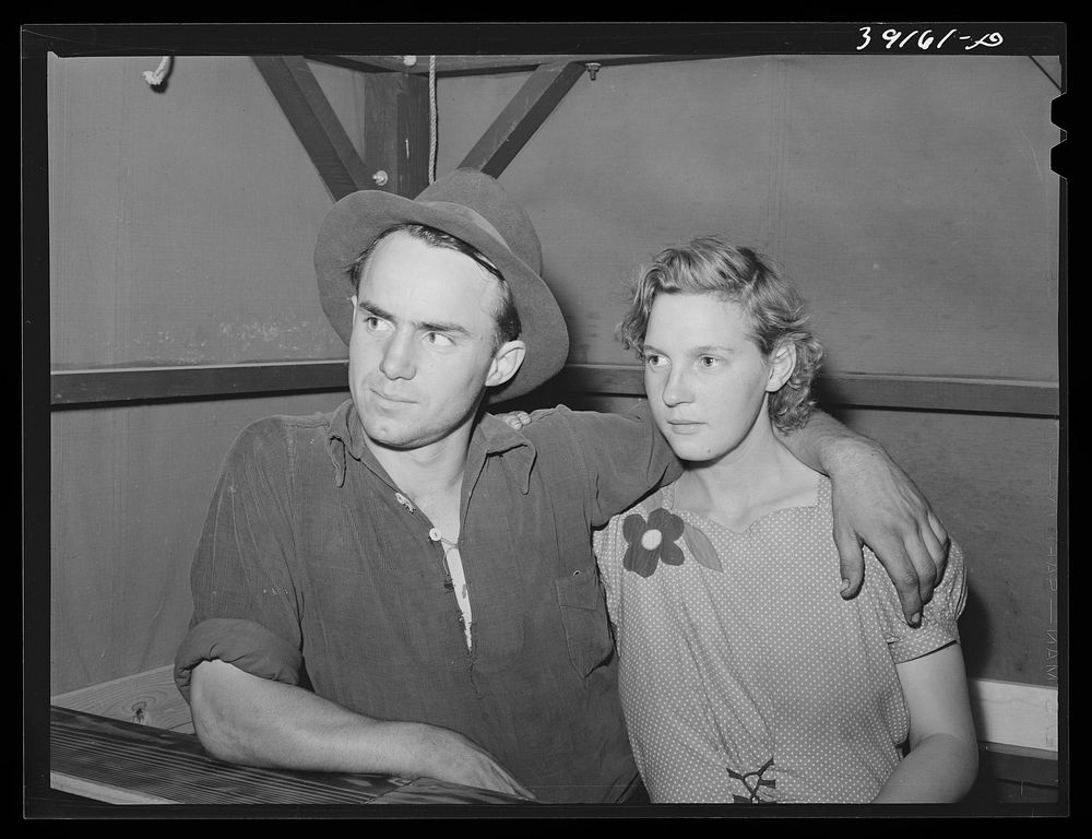 Farm worker and his wife at the FSA (Farm Security Administration) migratory labor camp mobile unit. Idaho by Russell Lee